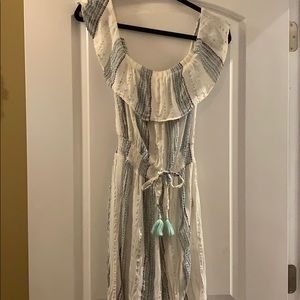 Surf Gypsy White with blue and gold jumpsuit